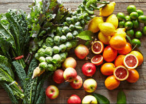 a group of fruits and vegetables on a wood surface Healthy Weight Loss Diets Warrington